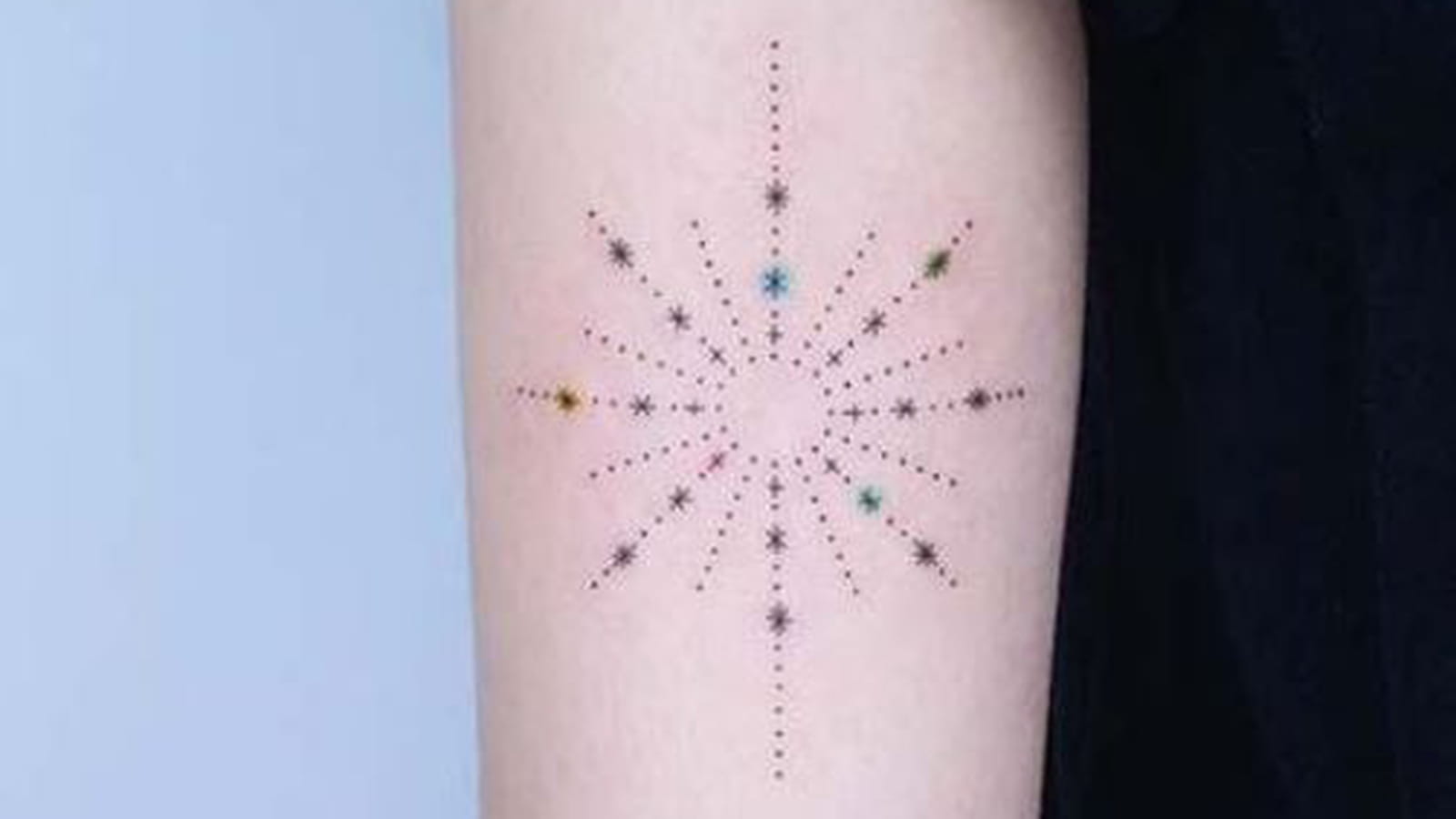 Etoiles minimalistes sur le bras