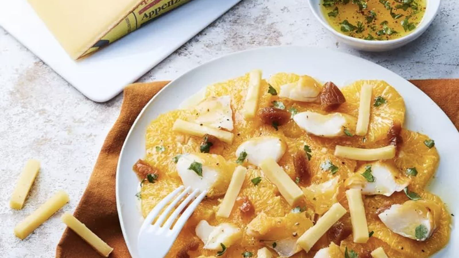 Carpaccio d’oranges au haddock et à l’Appenzeller® Surchoix