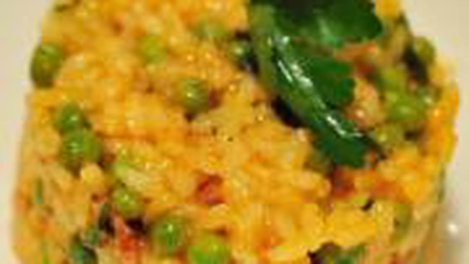 Risotto au coulis de tomate, chorizo, petits pois