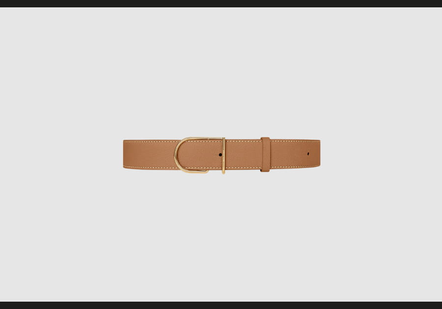 Ceinture en cuir camel &agrave; surpiq&ucirc;res blanches de Pol&egrave;ne