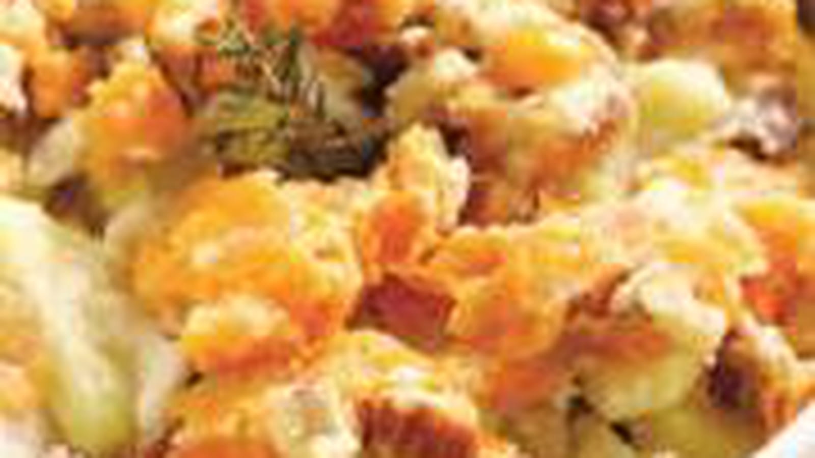 Crumble de pommes de terre, mimolette et colin