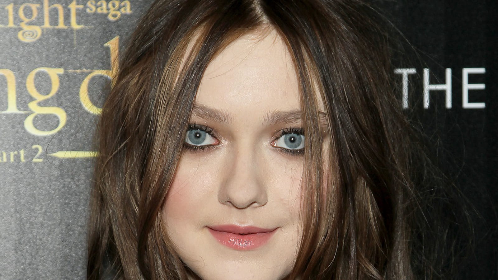 Dakota Fanning en brune