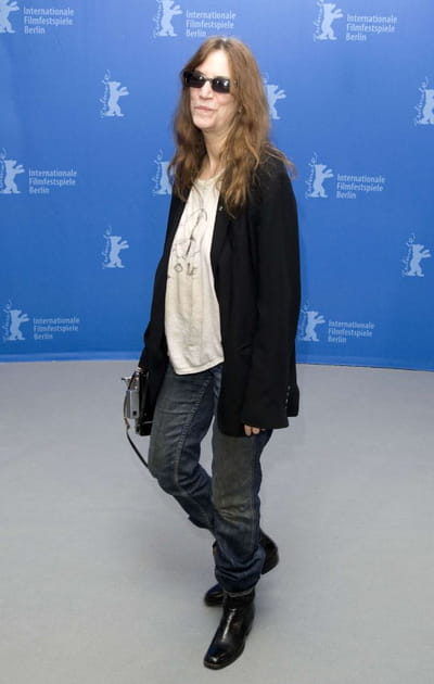Patti Smith en jean et chemise