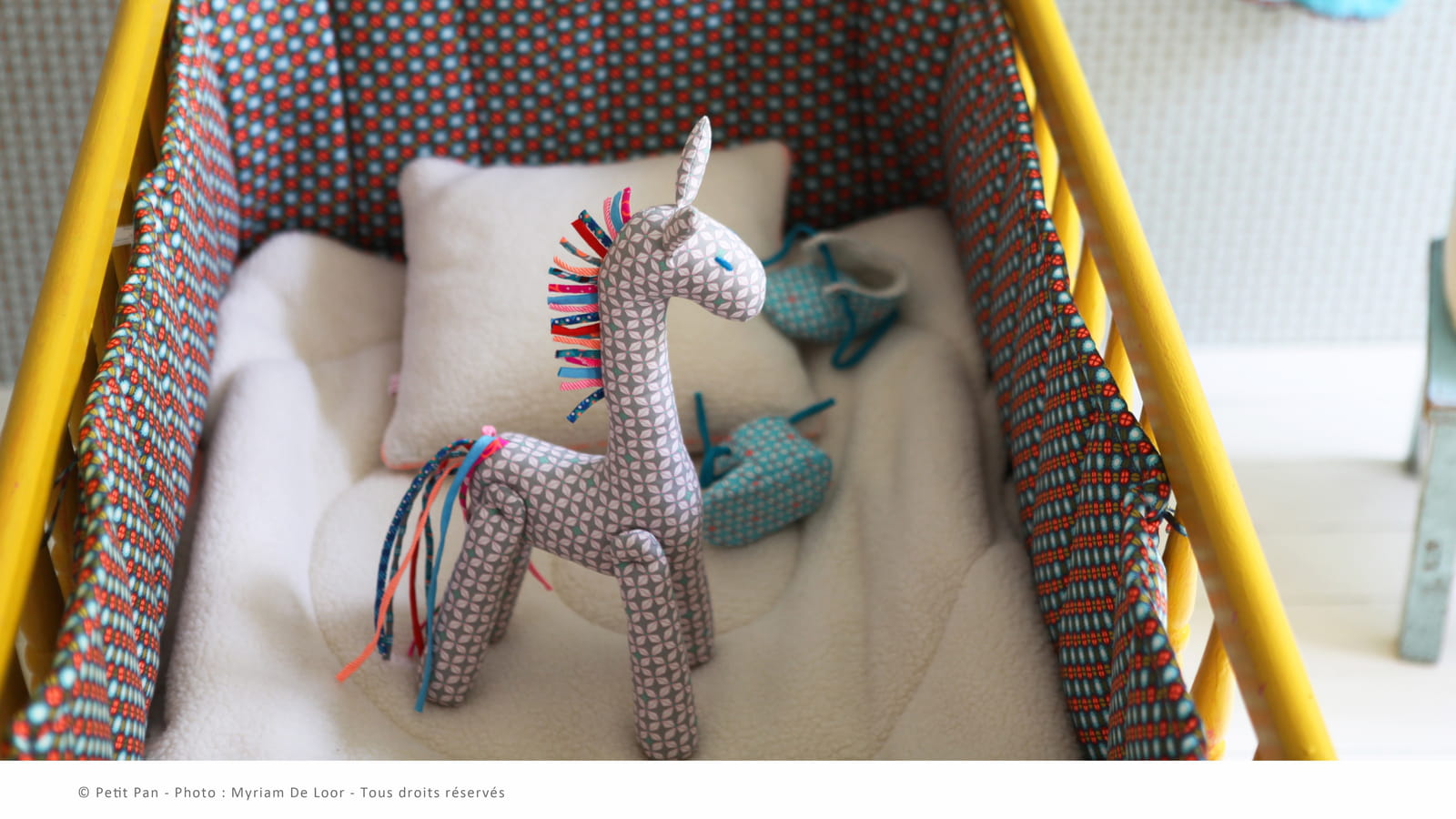 Edredon et coussin Petit Pan