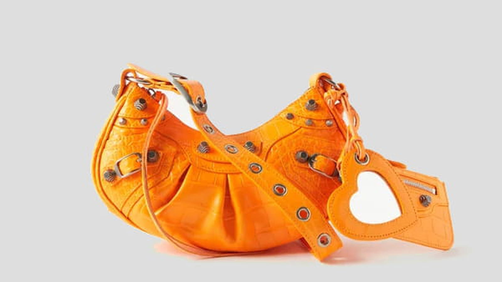 Sac à main en cuir effet crocodile orange "Cagole" de Balenciaga sur Matches 1397 euros au lieu de 2150 euros