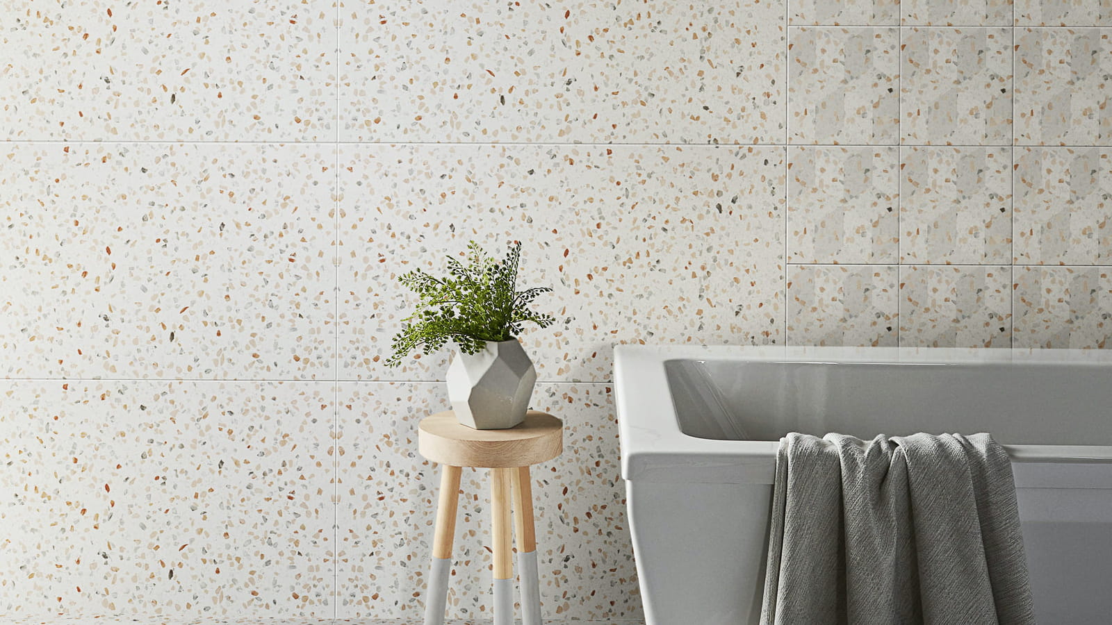 Revêtement effet terrazzo dans la salle de bains 