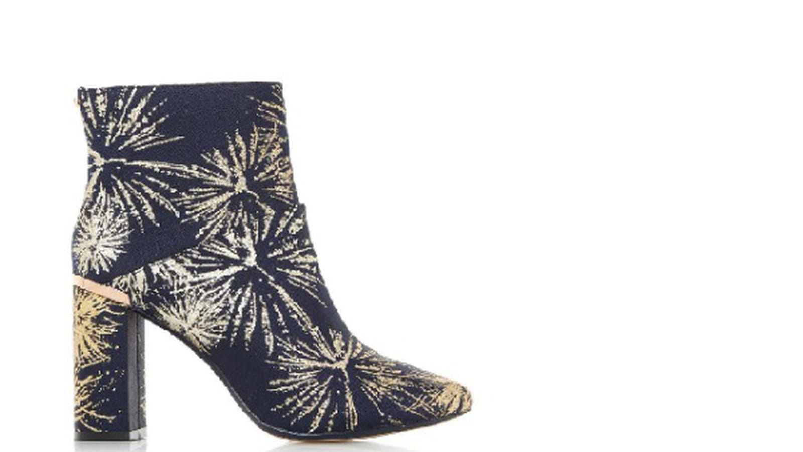 Pochette Comme des Garçons et bottines Dune