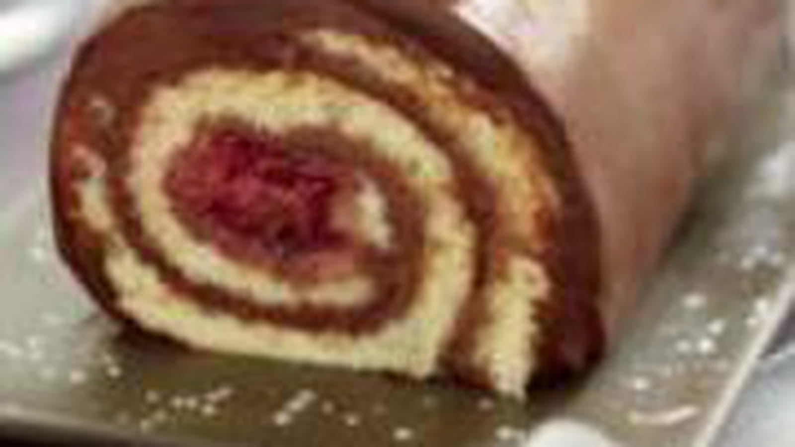 Bûche roulée chocolat, framboise, coco, citron