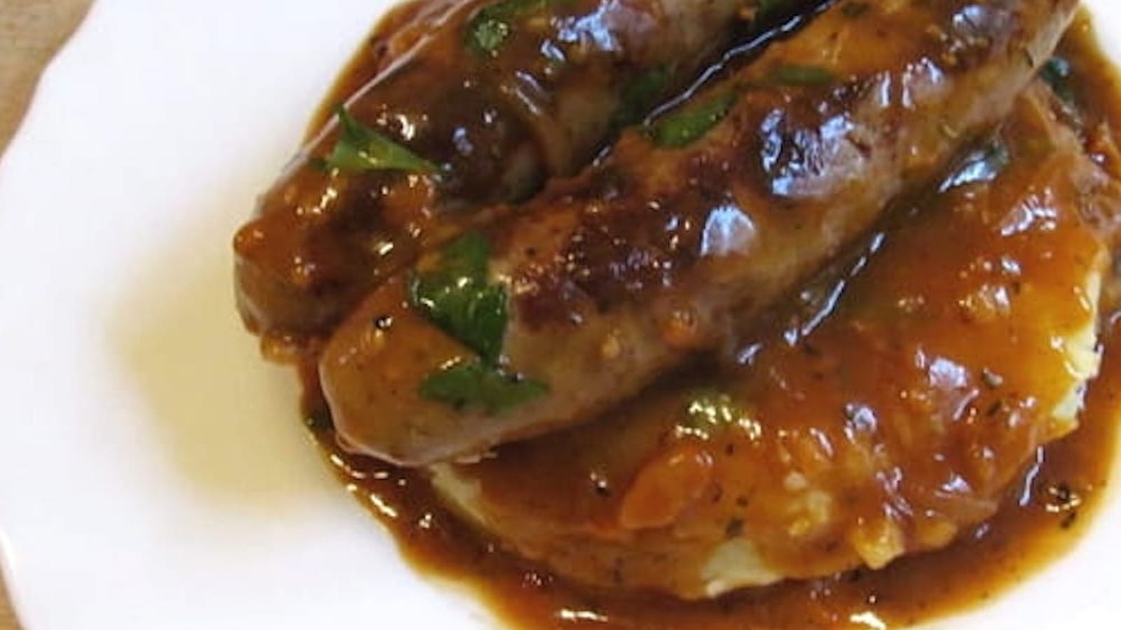 Saucisses en sauce