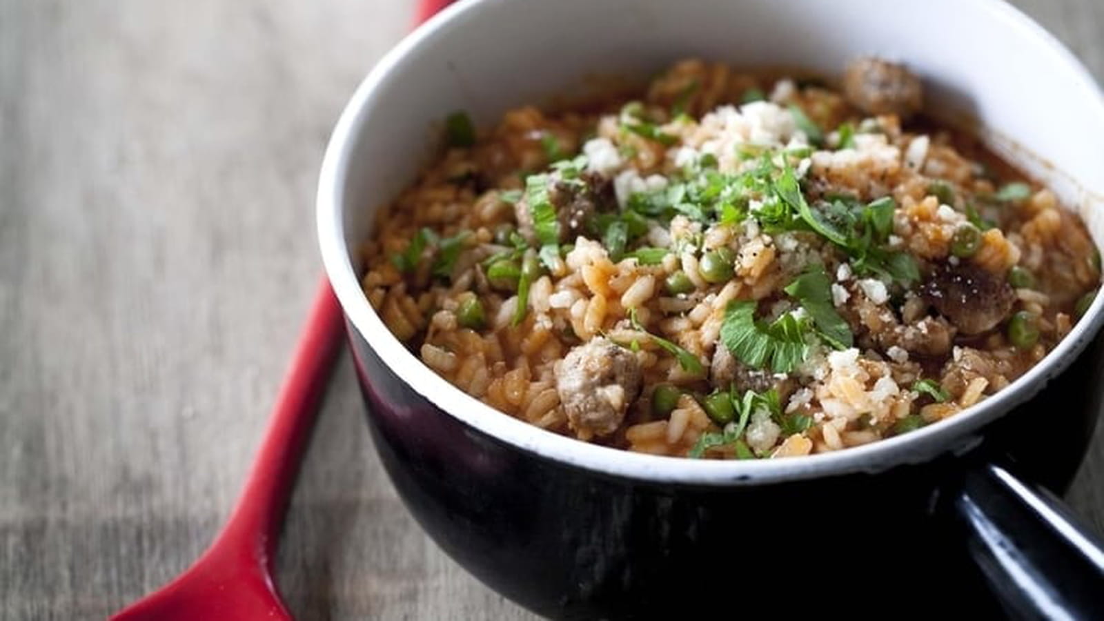 Risotto au Tomacouli®, saucisse et petits pois