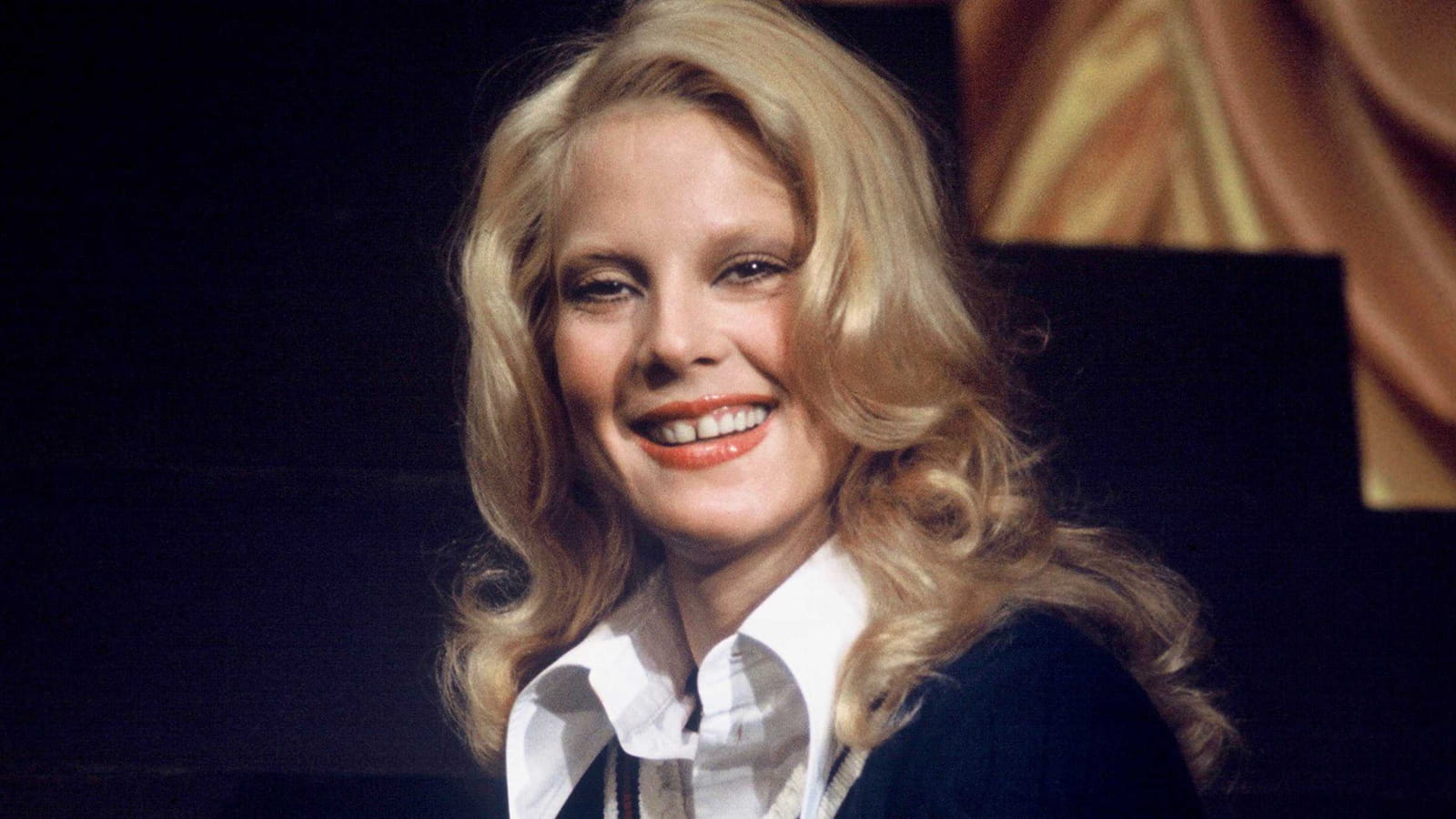 Sylvie Vartan et son gloss corail
