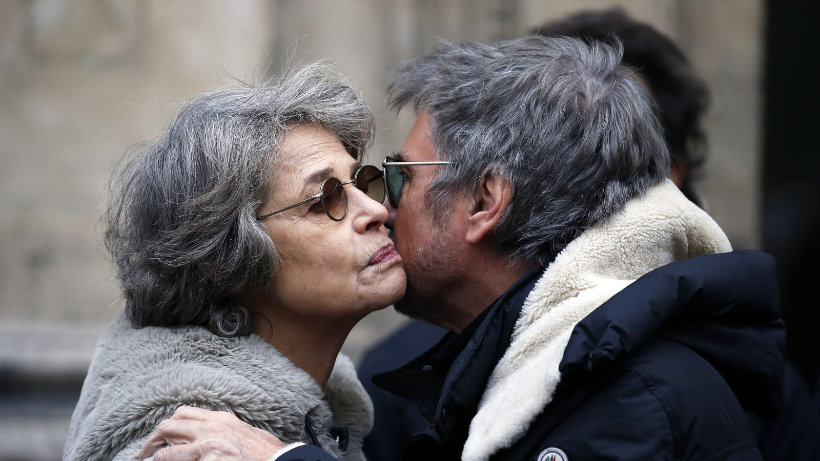 Avec son ex-conjoint Jean-Michel Jarre, aux obsèques du journaliste Henry Chapier, en 2019