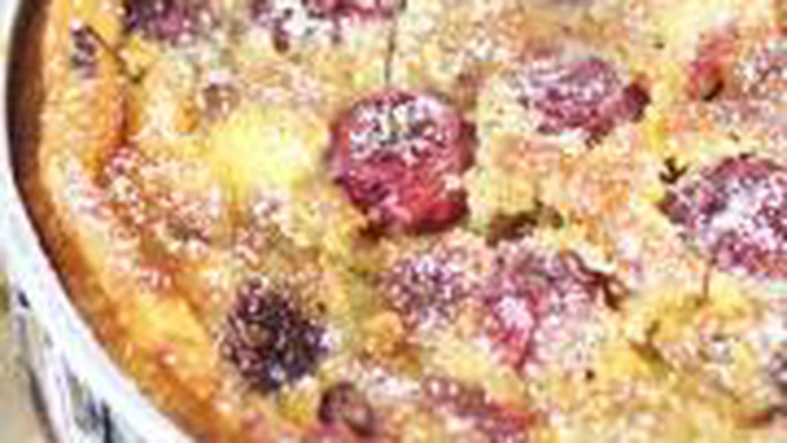 Clafoutis aux cerises, pistaches et sucre glace