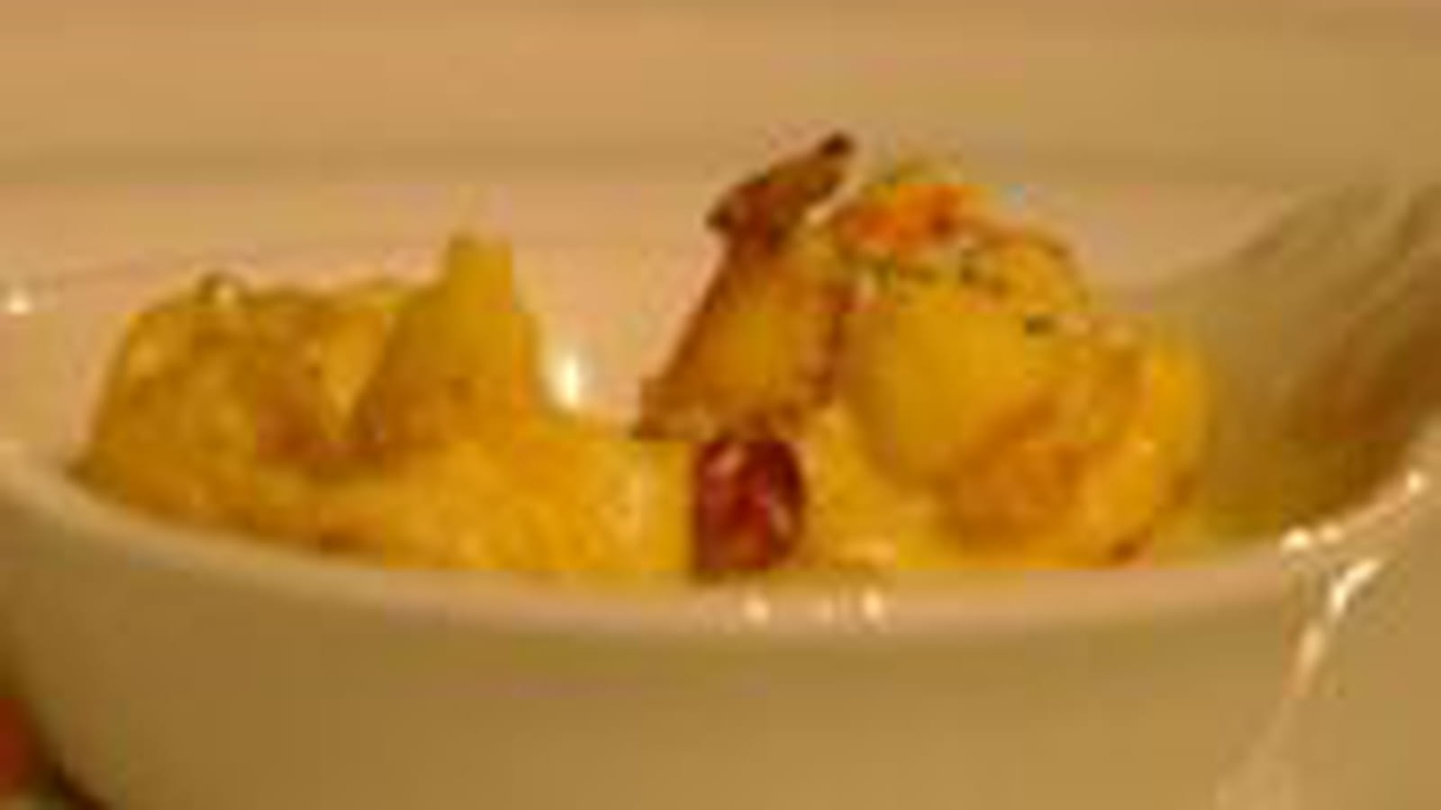 Cassolette de langouste flambée au cognac