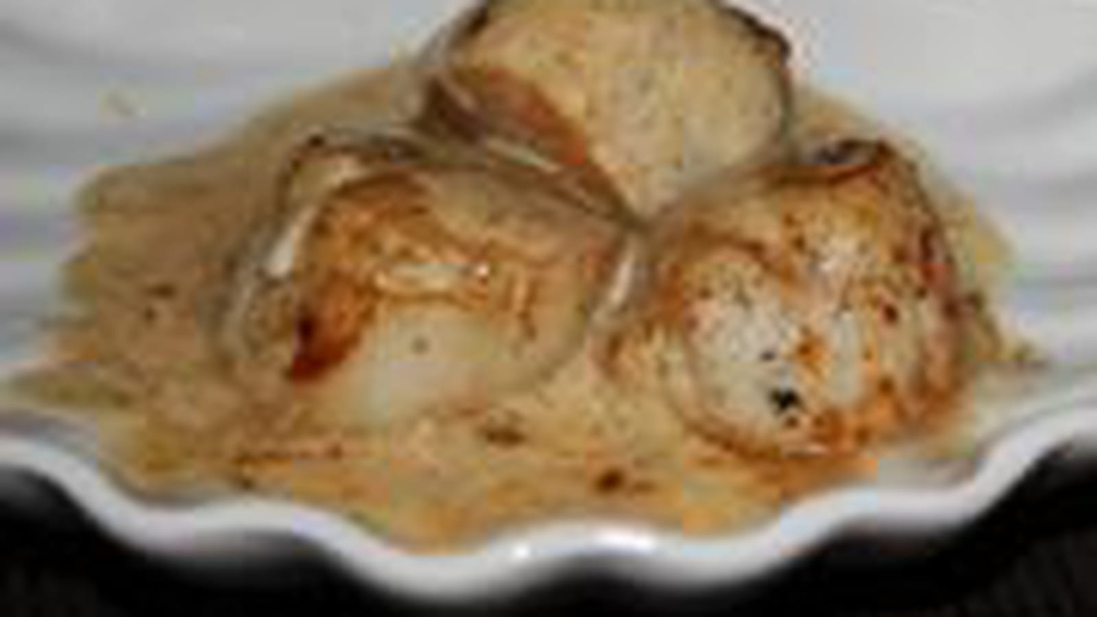 Noix de Saint Jacques à la crème vanillée
