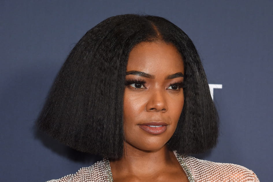 Raie au milieu et cheveux afros de Gabrielle Union