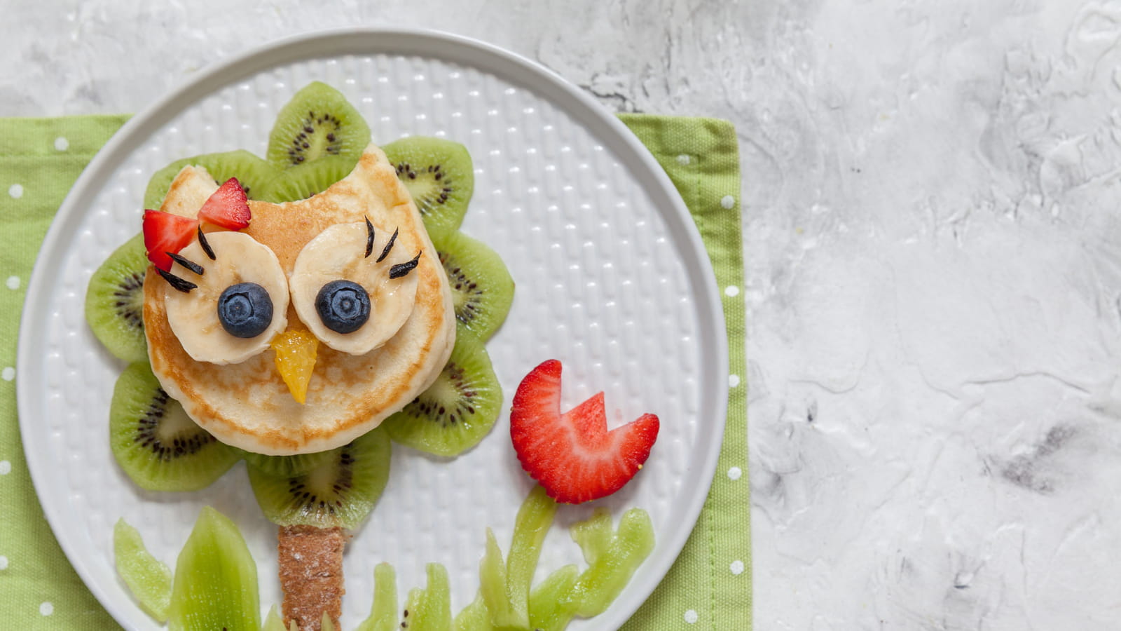 Un hibou sur son arbre perché