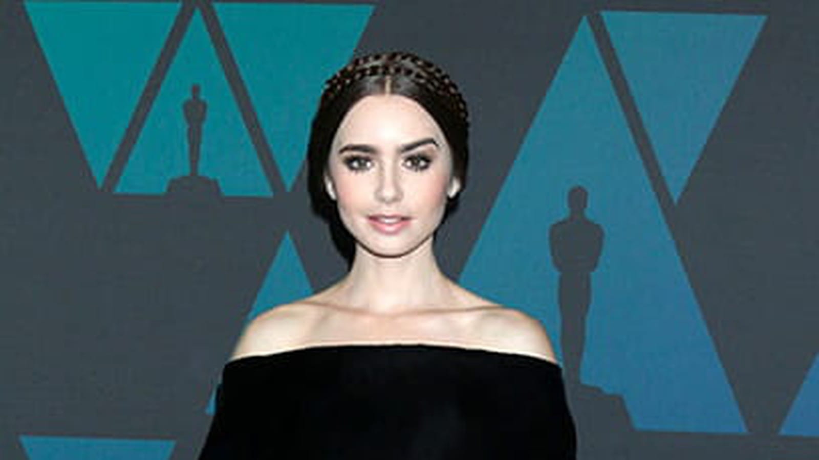 Lily Collins le 18 novembre 2018