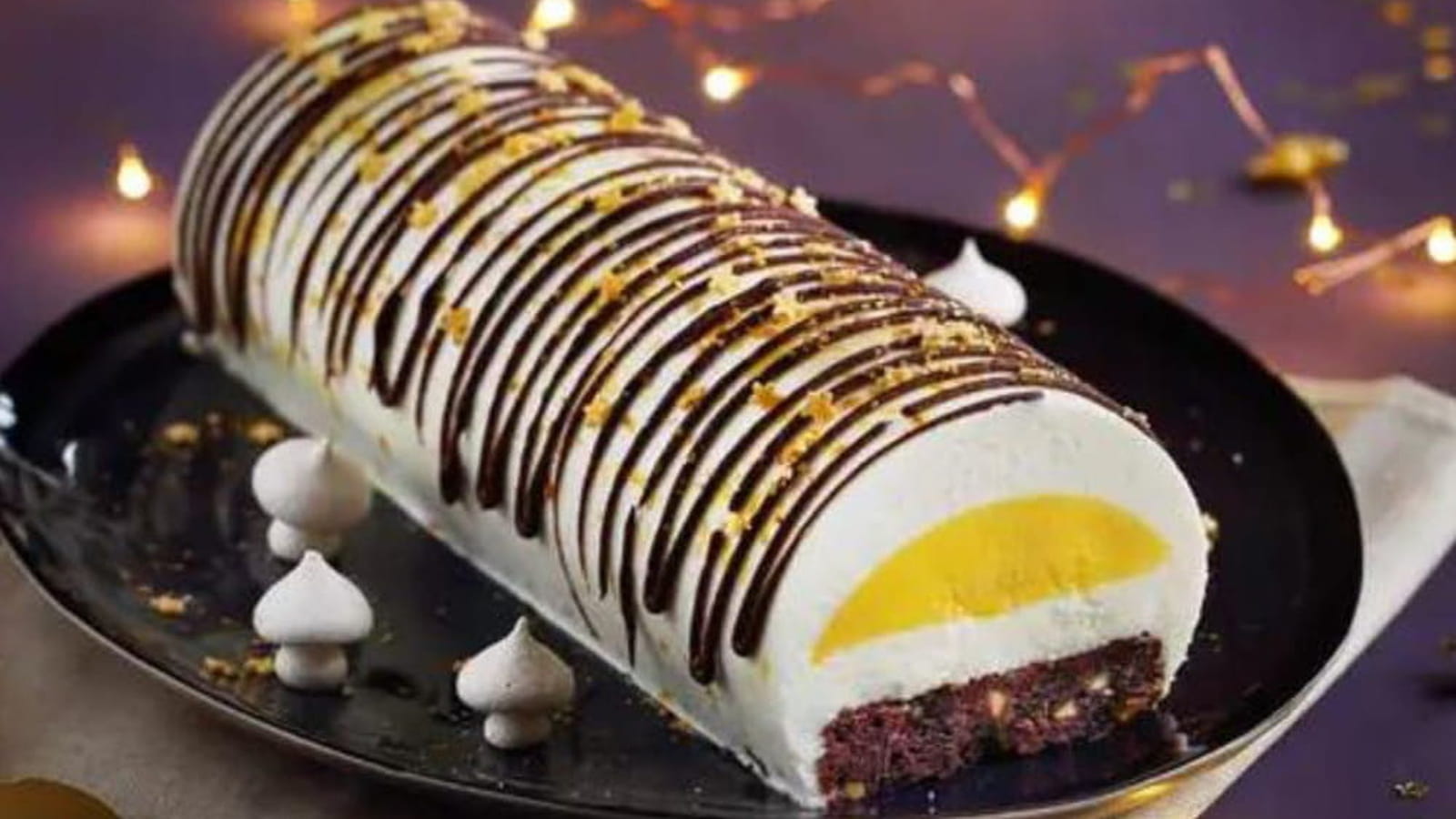 Bûche à la mousse de yaourt au lait de brebis, brownie et cœur à l’orange