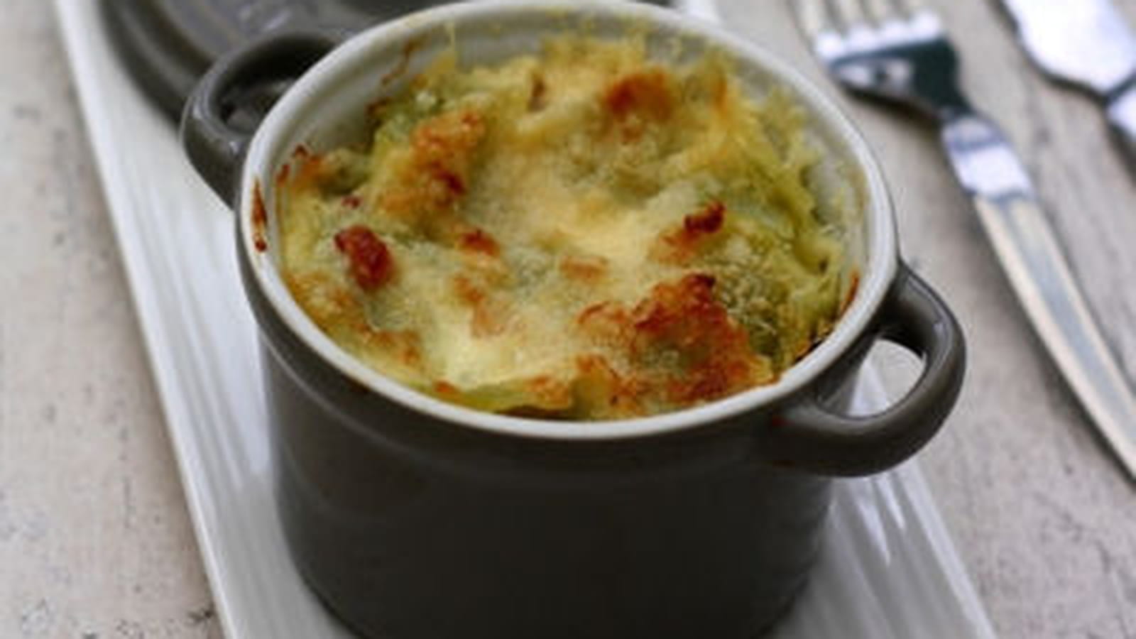 Gratin de ravioles au parmesan et lardons