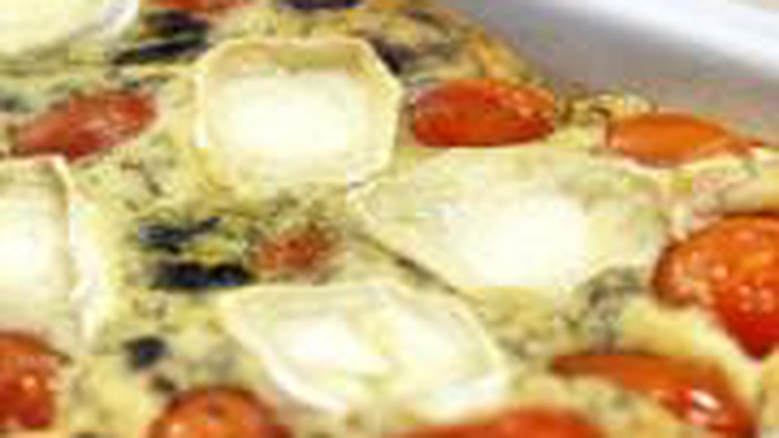 Clafoutis aux tomates cerises, olives noires et chèvre