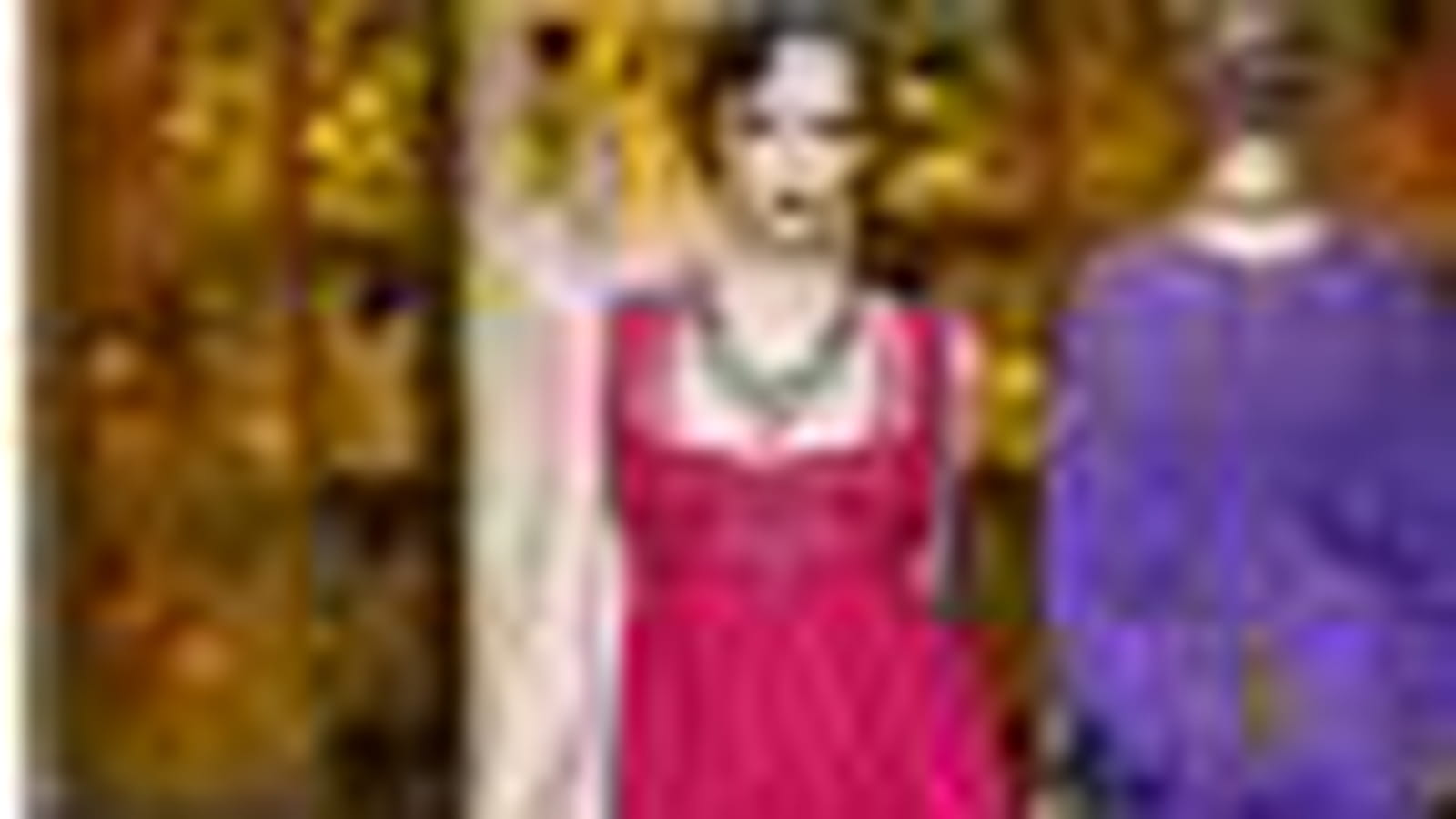 Robe fuchsia coupe Empire de Dior