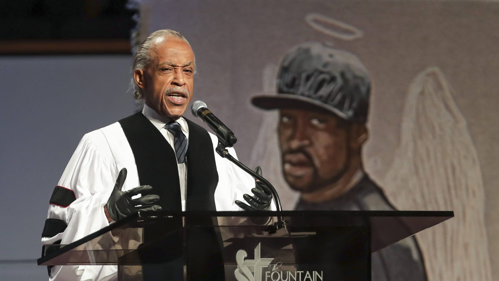 Al Sharpton au pupitre lors des obsèques
