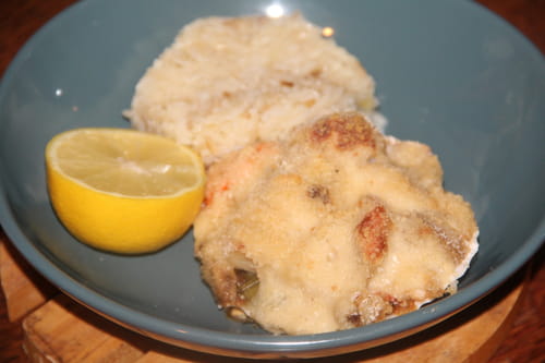 Coquilles gratinées de cabillaud, lieu et Saint-Jacques sur fondue de poireaux