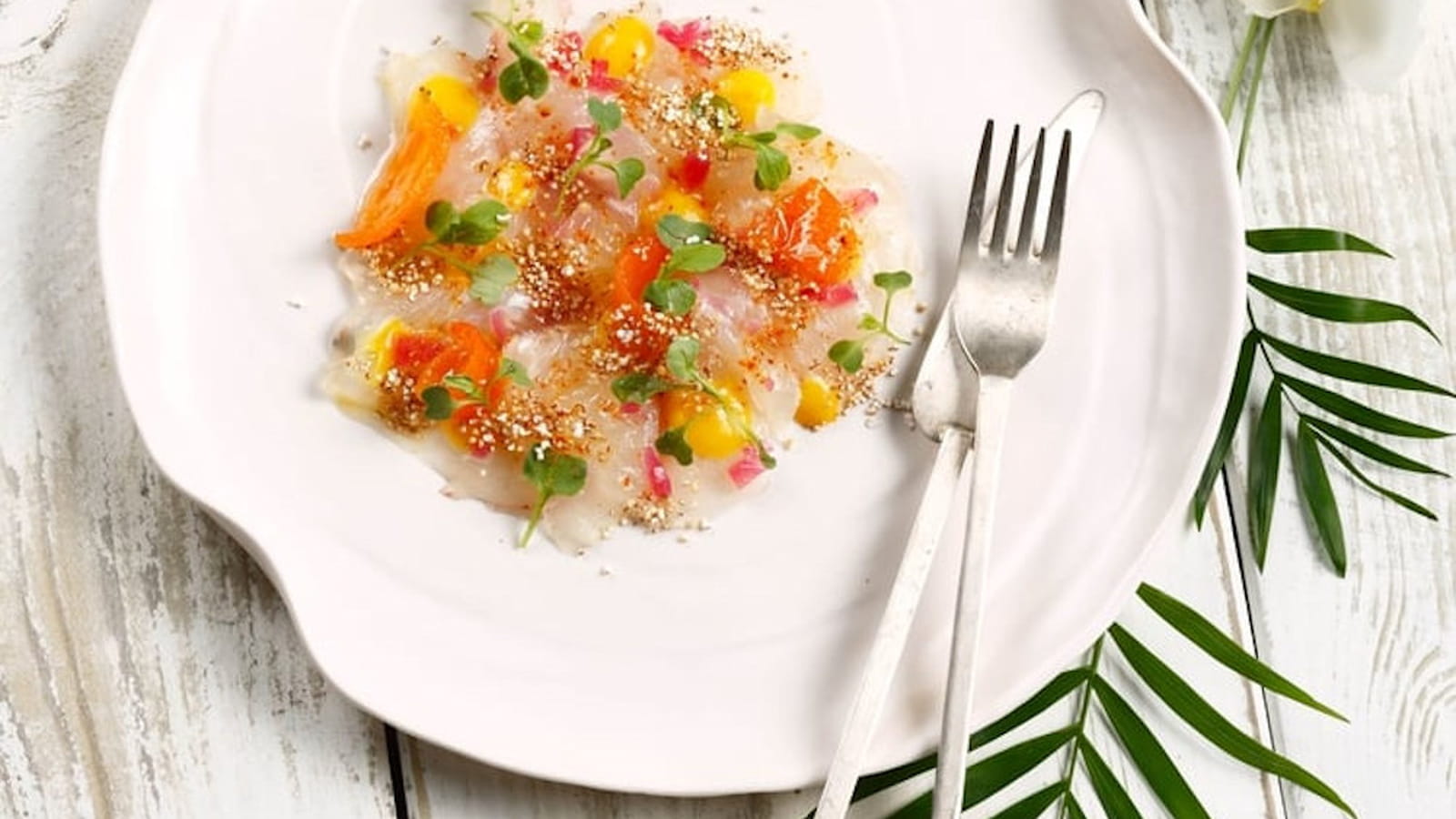 Carpaccio de daurade, kumquats et gelée au thé exotique