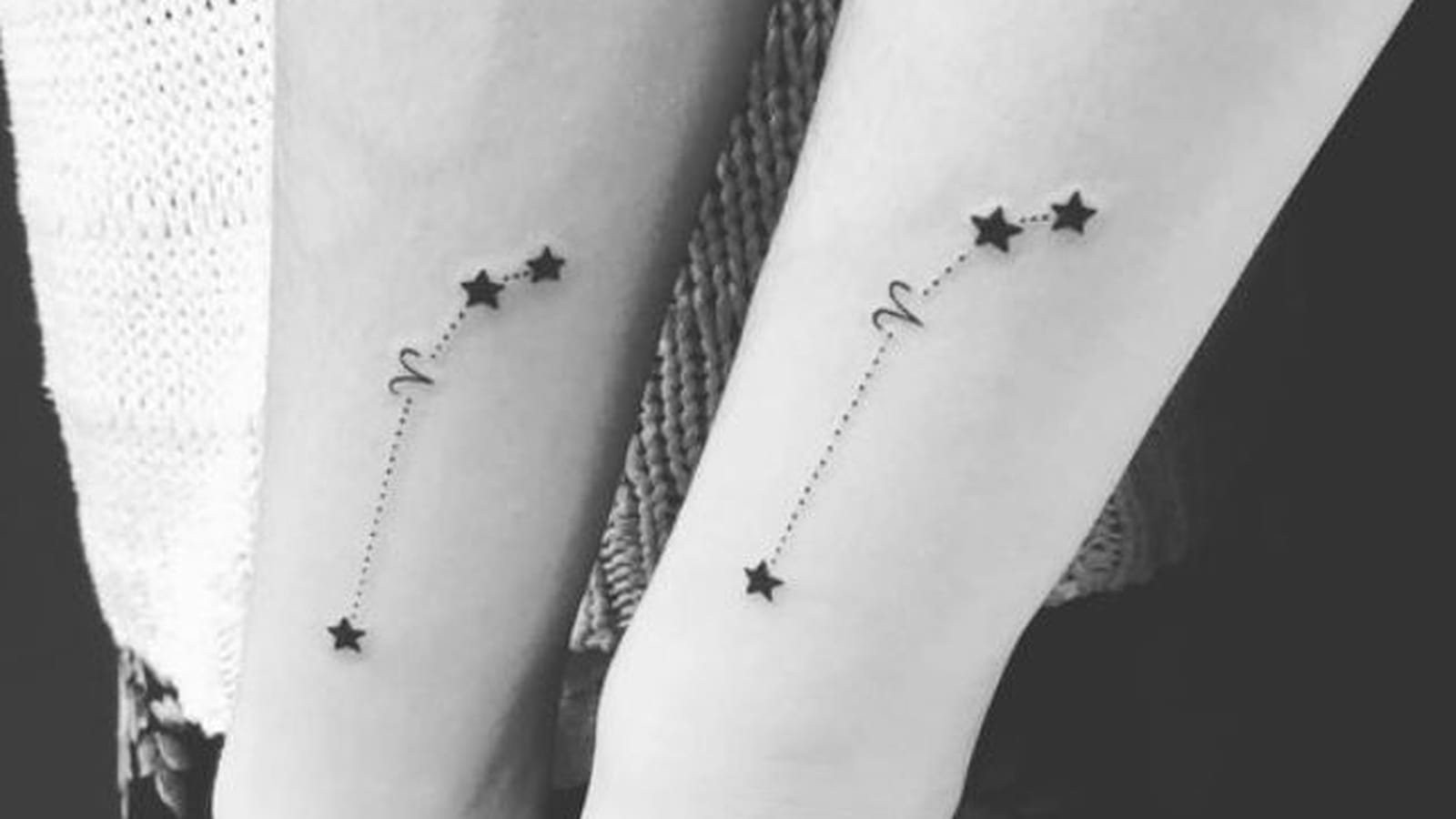 Etoiles et signe du bélier sur l'avant-bras