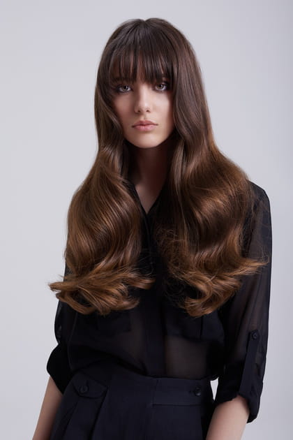 La frange avec longueurs soyeuses