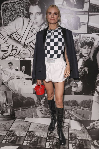 Diane Kruger en haut à damier et short blanc